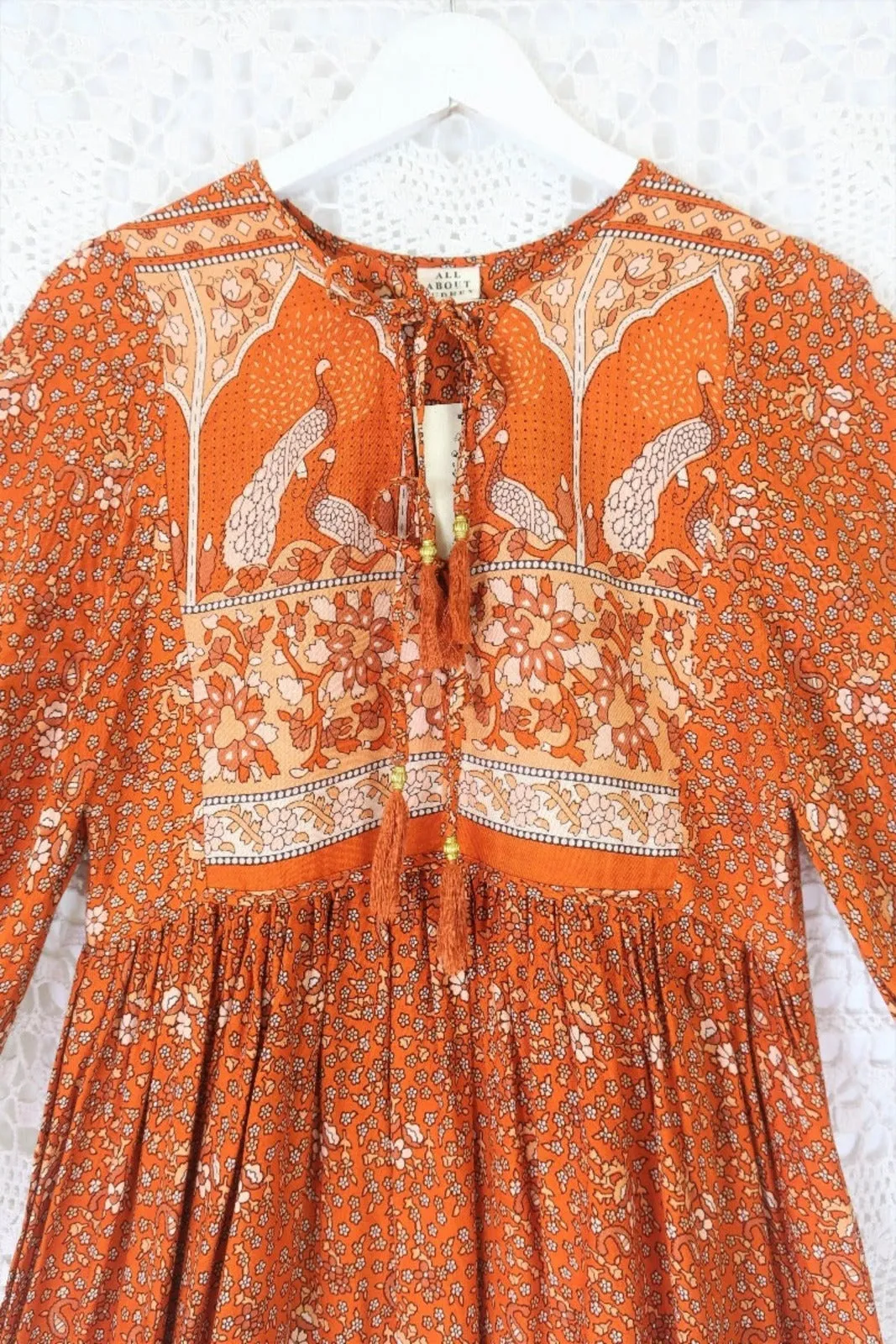 Peacock Primrose Dress in Burnt Orange