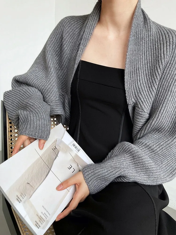 Sophisticated Layers: Gray Knitted Shrug Scarf