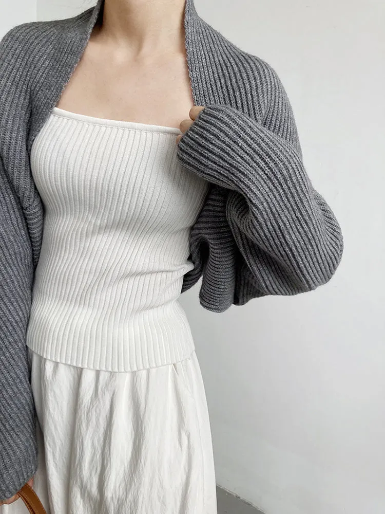 Sophisticated Layers: Gray Knitted Shrug Scarf